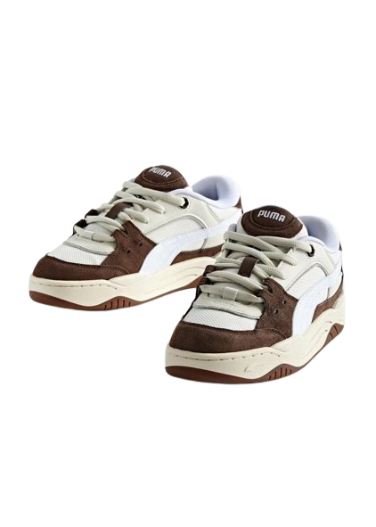 pair of Puma Carina Lift sneakers